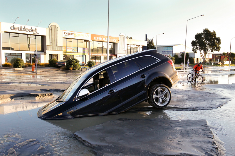 Illustration for article titled New Christchurch earthquake swallows SUV